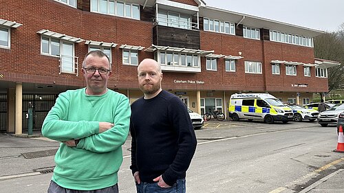 Tony and Robin outside Caterham Police Station two men outside caterham police station